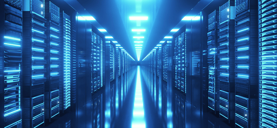 Data centre showing servers on both sides with a blue tint